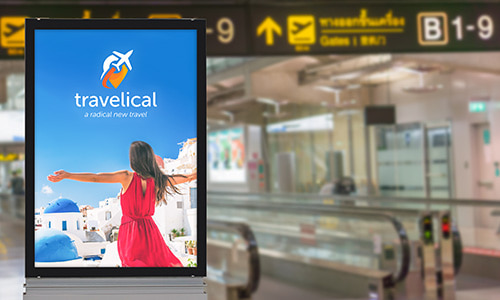 Non-Adhesive Backlit Film Translucent Material mounted near escalators advertising for a travel agency.